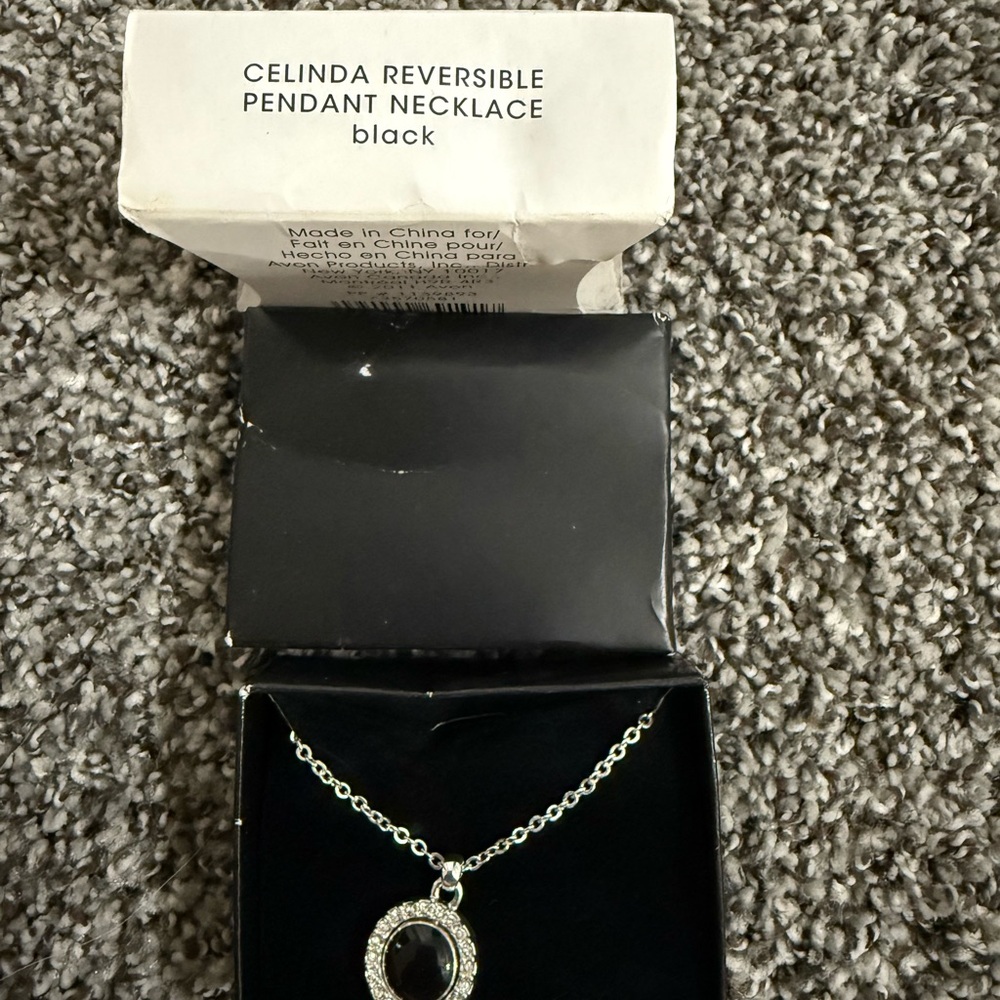 Avon Black and Silver Necklace with Circular Pendant